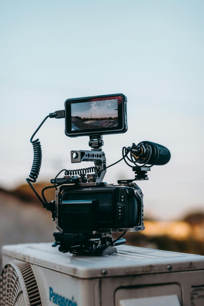 High-quality video recording equipment set up outdoors with a scenic view.
